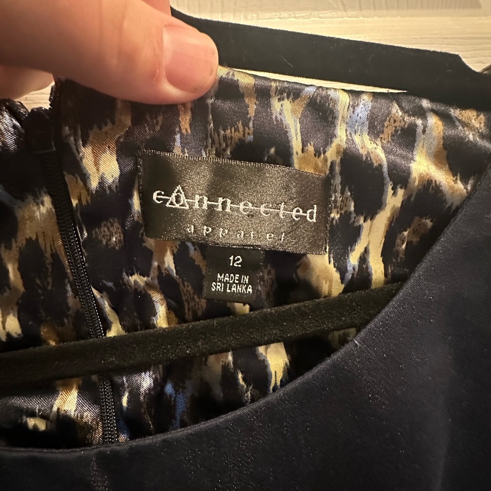 Connected Apparel Black Dress with Animal Print Lining